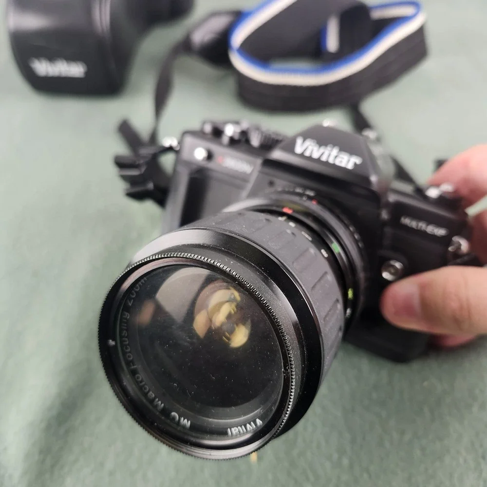 Vintage Vivatar V3800N 35mm SLR Film Camera with 28-70mm Lens & Haze-1 Filter